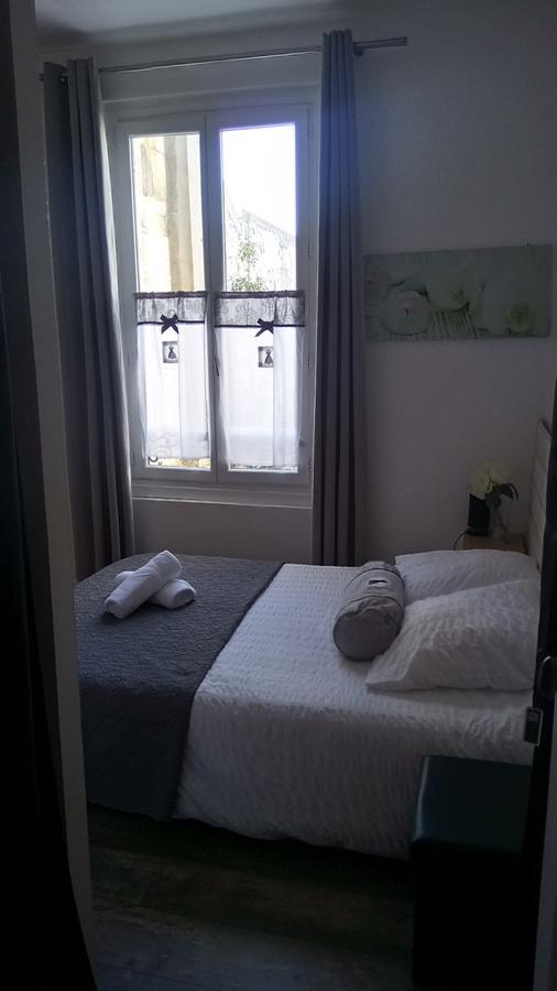 Maison De Ville Bed & Breakfast Magny en Vexin Bagian luar foto